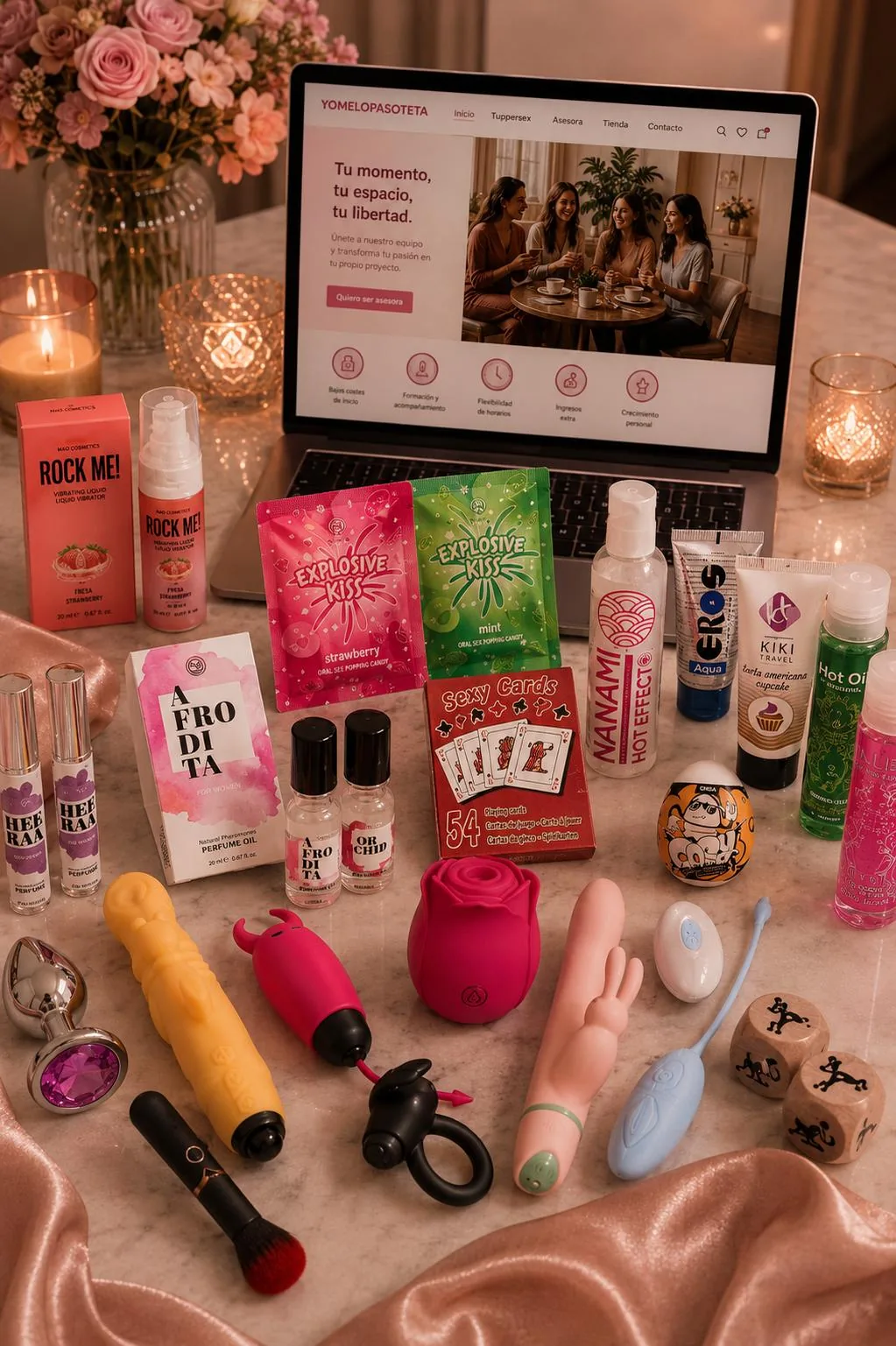 Selección de productos YoMeLoPasoTeta sobre mármol, con velas y flores